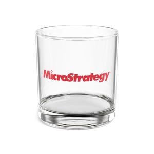 May include: A clear glass tumbler with the red text "MicroStrategy" printed on the side.