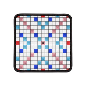 May include: A black and white Scrabble game board with red and blue squares. The board has a star in the center and the words "Double Word Score", "Double Letter Score", and "Triple Word Score" printed on the squares.