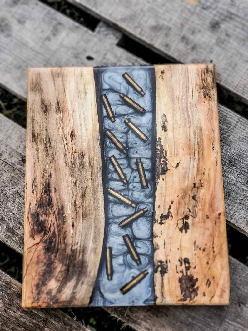 Epoxy resin cuttng board filled with bullet casings Etsy