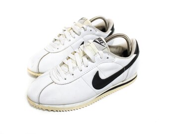 nike cortez white with black swoosh