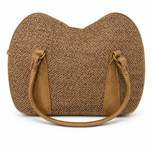 May include: A woven brown handbag with a unique shape, featuring a curved top and rounded sides. The bag has two handles made of a lighter brown material, attached with gold-colored hardware. The bag's texture appears to be tightly woven.
