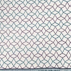 May include: White fabric with a geometric pattern of teal and purple stitching. The fabric has a teal fringe along the bottom edge.
