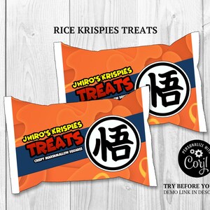 May include: Two orange and white Rice Krispies Treats packages. Each package has the text "Jhiro's Krispies Treats" in red and yellow, with a blue stripe. A black and white circular graphic is on each package.