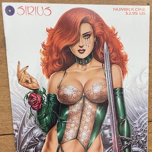 May include: A comic book cover featuring a woman with red hair wearing a green and black corset with a skull pattern. She is holding a sword and a rose. The title of the comic is "DAWN" and the publisher is "SIRIUS".