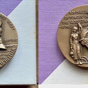 May include: A bronze medal with a portrait of John Greenleaf Whittier, an abolitionist and poet, on one side and a quote about words on the other side. The quote reads, "For of all sad words of tongue or pen, The saddest are these: 'It might have been.'"