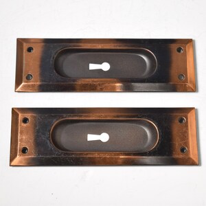 Pair of Keyed Pocket Door Pulls Circa 1920 With Elegant Rectangular Shape, Beveled Edge, and Japanned Finish image 2