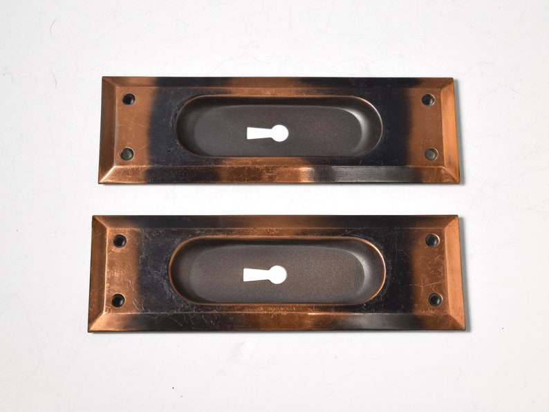 Pair of Keyed Pocket Door Pulls Circa 1920 With Elegant Rectangular Shape, Beveled Edge, and Japanned Finish image 2