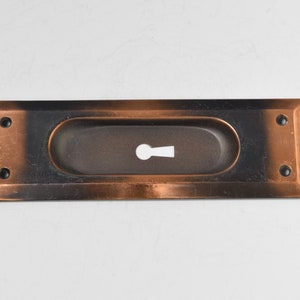 Pair of Keyed Pocket Door Pulls Circa 1920 With Elegant Rectangular Shape, Beveled Edge, and Japanned Finish image 4