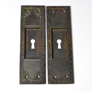 Pair Keyed Cast Bronze Late 1800s Early 1900s Pocket Door Plates With Natural Patina & Leafy Details image 1