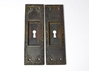 Pair Keyed Cast Bronze Late 1800s Early 1900s Pocket Door Plates With Natural Patina & Leafy Details