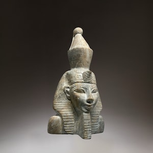 Unique Head of pharaoh Ramses II presenting power with the Cobra on His Head