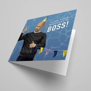 May include: A birthday card featuring a cartoon illustration of a man wearing a party hat and giving a thumbs up. The background is blue with a white pattern and yellow, pink, and blue bunting. The text on the card reads "Hope your birthday is BOSS!"