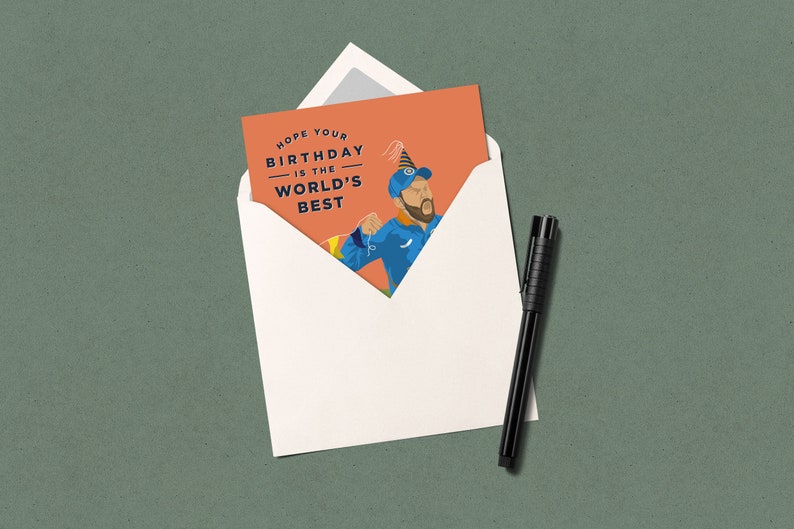 May include: A birthday card with an orange background featuring a cartoon illustration of a person wearing a blue shirt and a party hat. The text on the card reads "Hope your birthday is the world's best."