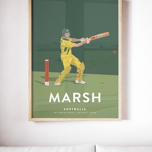 May include: An illustrated poster featuring a cricket player in action. The player is wearing a yellow jersey with the Australian cricket team logo and a green helmet. The poster has the text "Marsh" in large white letters and "Australia International Cricket Icon" in smaller white letters.