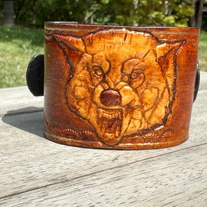 Genuine leather cuff bracelet, handmade embossed drawing head of wolf