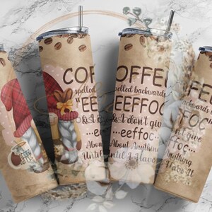 May include: Four stainless steel tumblers with a brown background and a gnome design. The tumblers have a quote about coffee that reads "Coffee spelled backwards is "eeffoc" and I don't give a ... eeffoc... about anything until I have it."