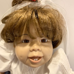 Syndees Crafts Vintage dolls;  doll hair; soft bodied dolls; brown eyed girl; doll brown hair; vintage toys and doll making
