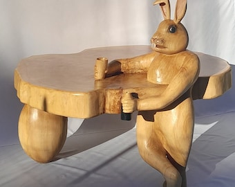 Party rabbit, natural wood table, with rabbit sculpture made ineptly by hand. Original and one of a kind.