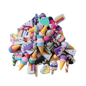May include: A collection of colorful miniature food charms, including ice cream cones, cake slices, and candy. The charms are made of polymer clay and are perfect for adding a touch of whimsy to crafts and decorations.