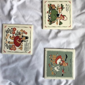 Vintage Kemper-Thomas Art Plagues
