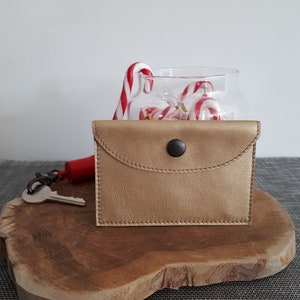 Porte cartes en cuir doré