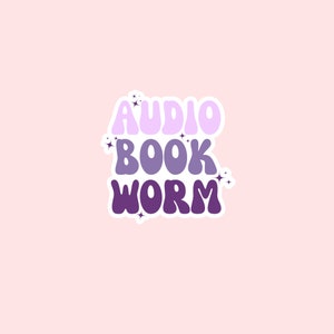 May include: A sticker with the text "AUDIO BOOK WORM" in a retro font. The text is in shades of purple and pink with white outlines.