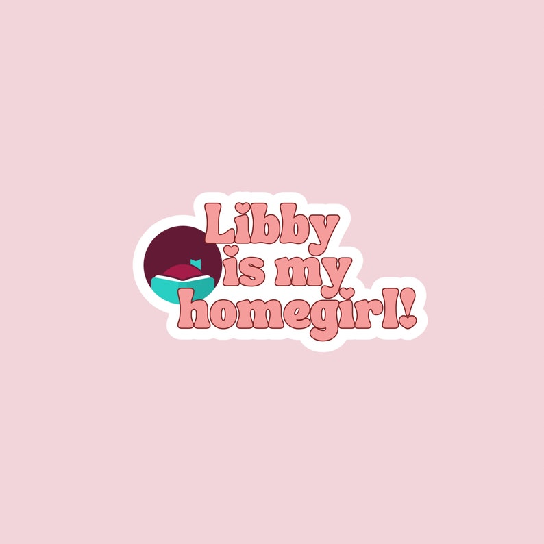 May include: A sticker with the text "Libby is my homegirl!" in pink, retro-style lettering. The sticker features a cartoon graphic of a face with a book. The background is a solid light pink.