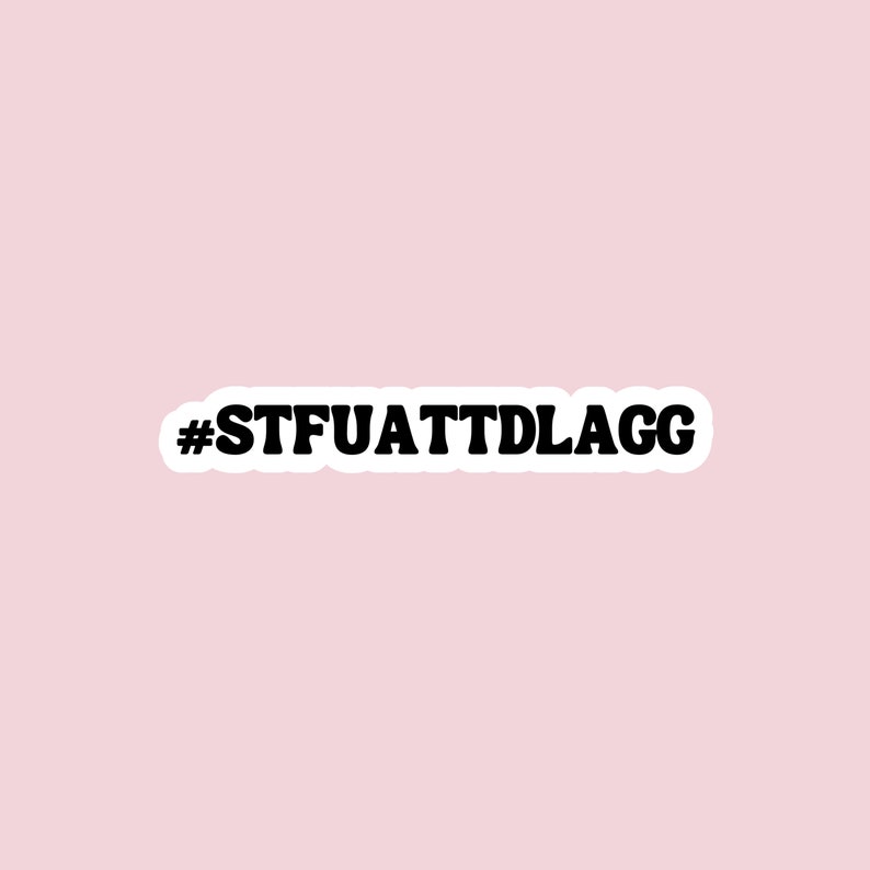 May include: Black and white sticker with the text "#STFUATTDLAGG" on a pink background.