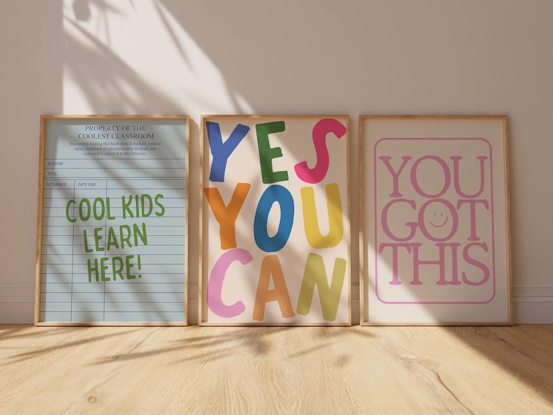 May include: Three framed art prints with positive messages. One print reads "Cool Kids Learn Here!" in green. Another says "Yes You Can" in colorful letters. The third print says "You Got This" in pink.