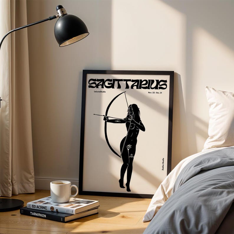 May include: Black and white illustration of a Sagittarius zodiac sign. The illustration features a woman with a bow and arrow, standing on a white background. The text "Sagittarius" is written in a bold, stylized font at the top of the image.