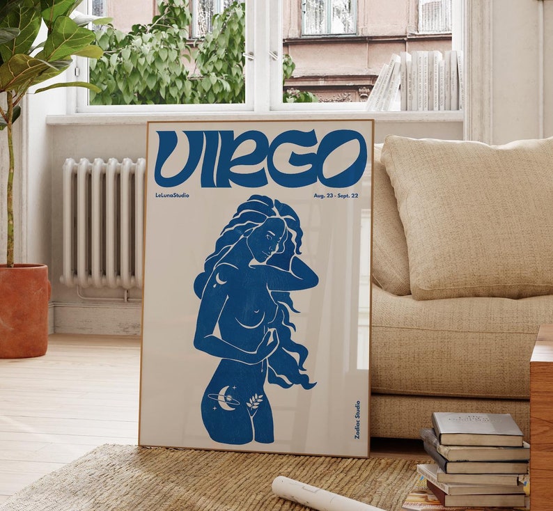 May include: Virgo zodiac poster featuring a blue illustration of a woman with flowing hair. The text on the poster includes 'Virgo', 'Aug. 23 - Sept. 22', 'Lettera Studio', and 'Zodiac Studio'. The poster has a minimalist design with a cream background.