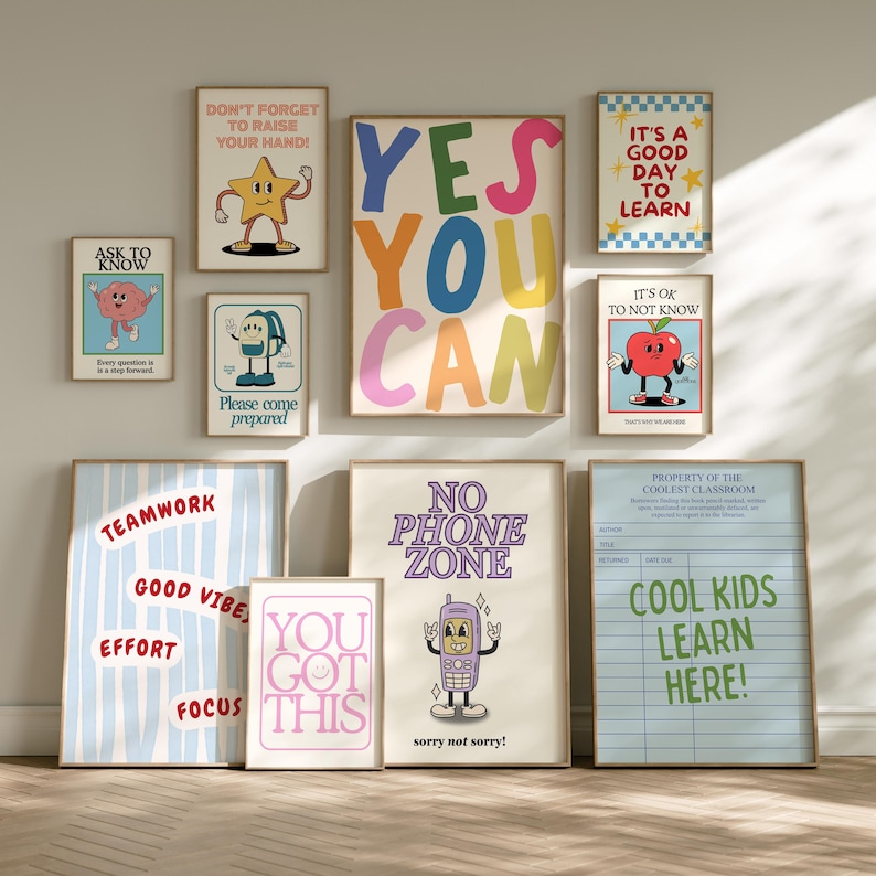 May include: A collection of framed posters with motivational and classroom-themed messages. The posters feature colorful text and cartoon illustrations, including phrases like "Yes You Can," "Cool Kids Learn Here," and "No Phone Zone."