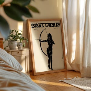 May include: A black and white illustration of a Sagittarius zodiac sign. The illustration depicts a woman with an arrow and bow. The text "Sagittarius" is written in bold, black letters at the top of the image. The text "Nov. 22 - Dec. 21" is written in smaller, black letters below the word "Sagittarius".
