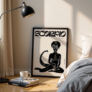 May include: Black and white poster with the word "Scorpio" in a stylized font. The poster features a black silhouette of a woman with a scorpion tail, sitting with her legs crossed. The woman has gold accents on her body and the scorpion tail.