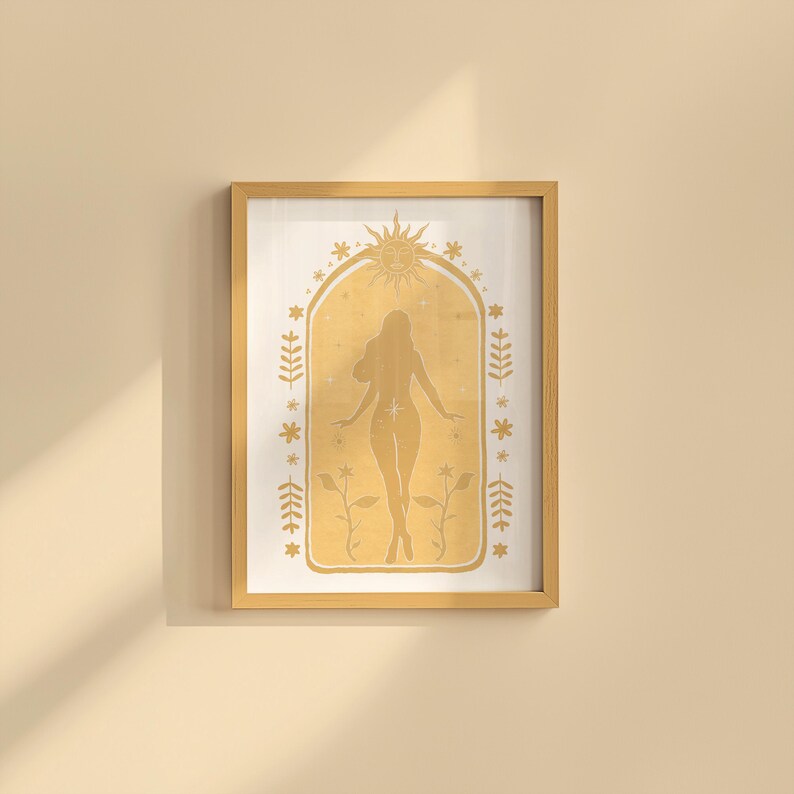 May include: A framed wall art print featuring a golden yellow silhouette of a person standing within an arched border. The design includes a sun icon at the top, small stars, and floral motifs along the sides, all set against a light background.