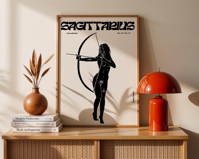 May include: Black and white illustration of a Sagittarius zodiac sign, a woman with a bow and arrow, with the text "SAGITTARIUS" and "Nov. 22 - Dec. 21" on a white background.