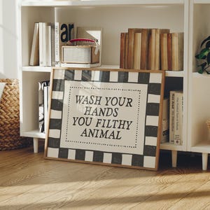 May include: A handmade wooden sign with the text "Welcome" in a playful font. The sign is painted white with a distressed finish, and features a small, decorative heart. Perfect for adding a touch of rustic charm to any entryway.