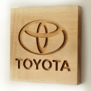 wooden Toyota Logo, wooden Toyota emblem for wall hanging, Garage decor for car fans, Cozy automotive design interior, Carved Toyota sign