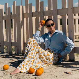 Wide-leg palazzo pants with orange pattern