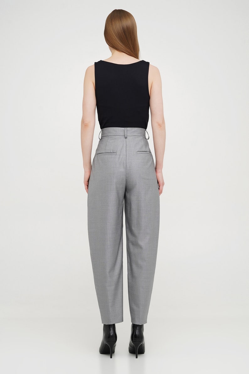 Wool women trousers with pockets, belt loops, pleats and baggy fit