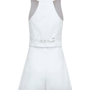 Back side of white cotton cropped vest with buttons