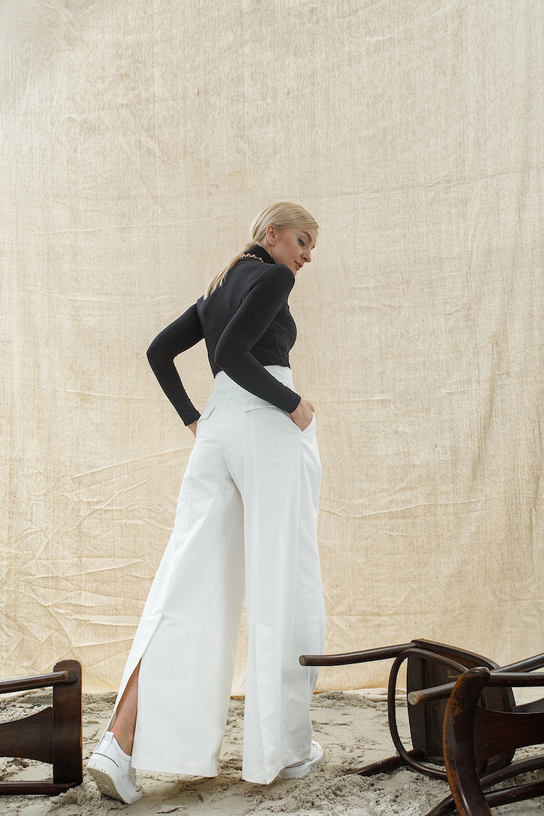 Wide leg trousers for women with high waist, back vents and pockets