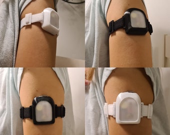 L’accessoire médical OmniPod Armband/Holder protège votre capteur blanc/noir