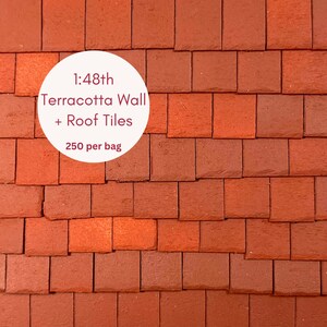 May include: A close-up of terracotta wall and roof tiles in a 1:48th scale. The tiles are a reddish-brown colour and are arranged in a staggered pattern. The text "1:48th Terracotta Wall + Roof Tiles 250 per bag" is printed on a white circle.