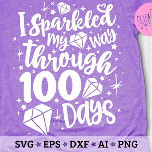 May include: Purple t-shirt with white text that reads "I sparkled my way through 100 days" with diamond and star graphics.