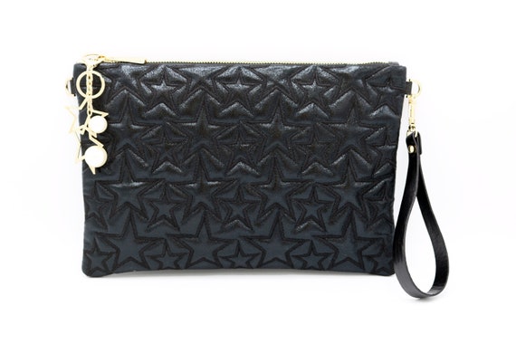 black shiny clutch bag