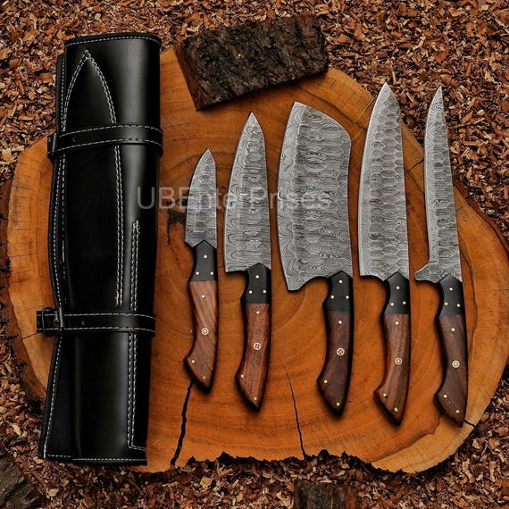 Hand-forged Damascus steel chef tools with that hypnotic swirling pattern — functional kitchen art that no mass retailer is selling.