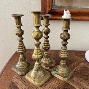 Antique English brass beehive candlesticks.