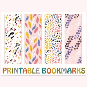 May include: Four colourful printable bookmarks featuring floral and leaf patterns. Designs include pink, yellow, blue, and black elements on white and pink backgrounds. The text "PRINTABLE BOOKMARKS" is displayed in various colours at the bottom.