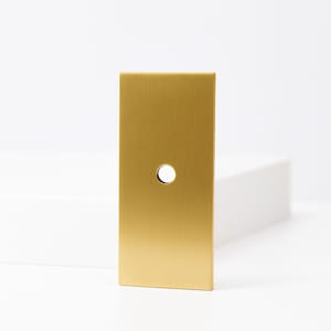 Placa trasera rectangular de latón para pomo - Moderna (2,25 pulg. x 1 pulg.)